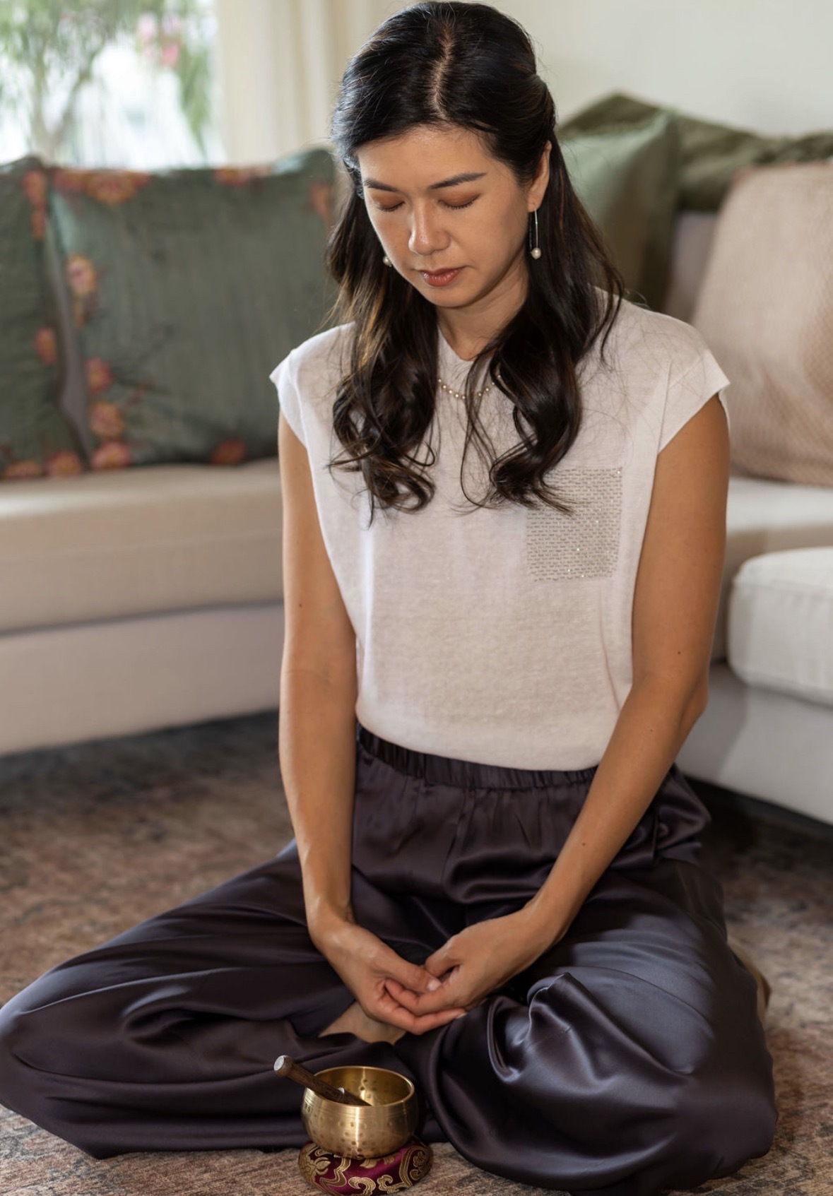 Dr. Stacy Chiang in seated meditation